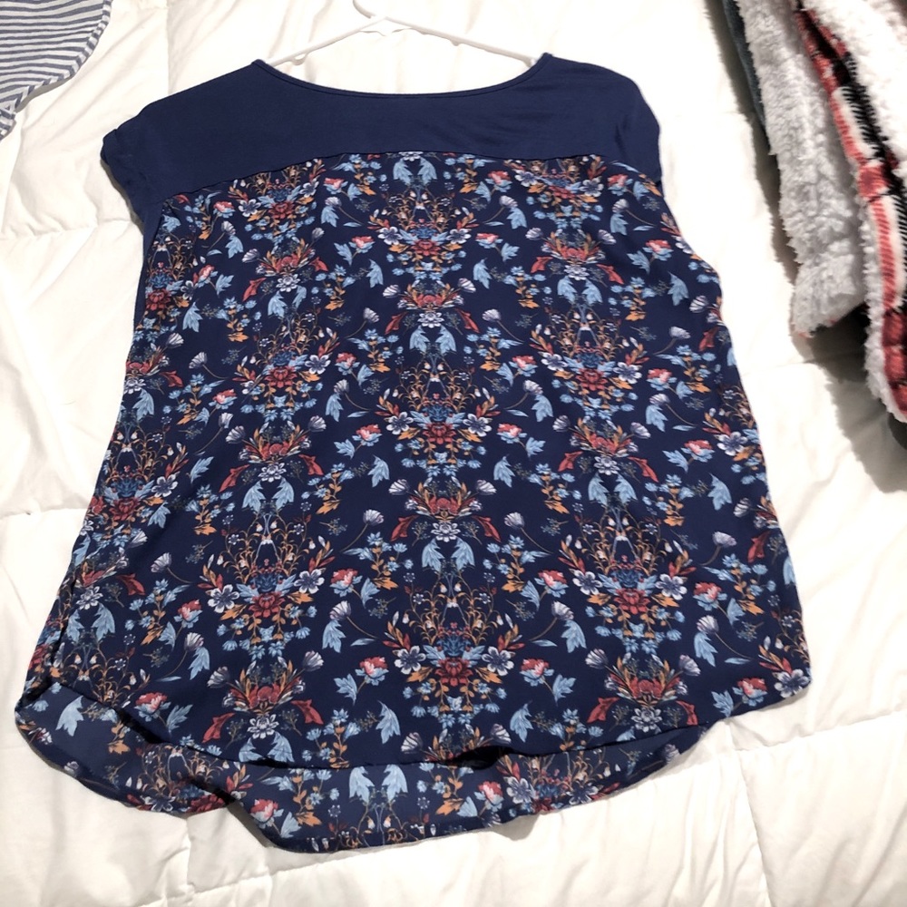 Blue shirt fits a lot of sizes